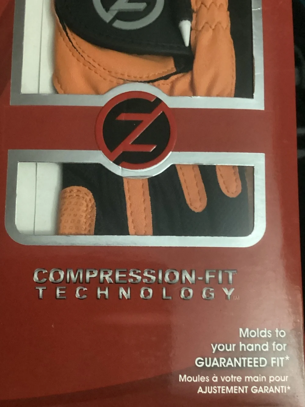 Zero Friction Junior Golf Glove in Orange and Black